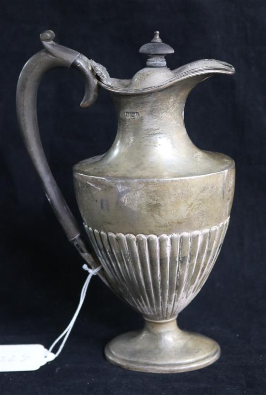 An Edwardian demi fluted silver oval hot water pot, James Deakin & Sons, Sheffield, 1902, gross 13.5 oz.